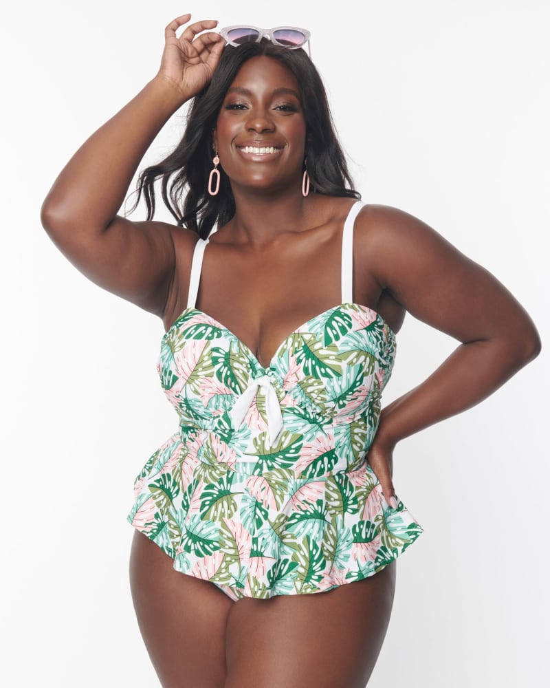 Front of a model wearing a size 2X Unique Vintage Green Monstera Print Solana Tankini Swim Top in Green Monstera Print by Unique Vintage. | dia_product_style_image_id:348046